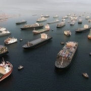 Recent Iranian attacks on vessels have slowed tanker-to-tanker oil transfers outside the Strait of Hormuz.